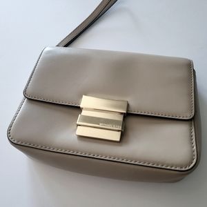 Authentic Michael Kors Cream/Tan small purse wristlet (w. Care card)